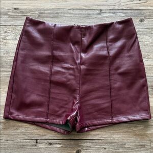 Akira high waisted burgandy leather shorts